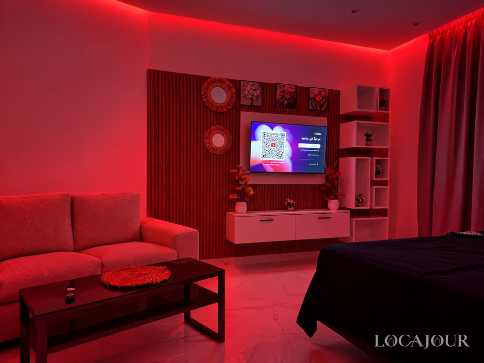 Luxury living room in Agdal Rabat furnished studio with Smart TV sofa modern decor and ambient lighting